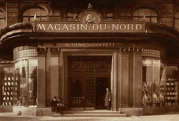 Historic photo of the original Magasin du Nord building on Kongens Nytorv, showing its classic 19th-century architecture and vintage charm.