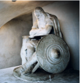 Holger Danske statue of a seated warrior with shield at Kronborg Castle, Helsingør.